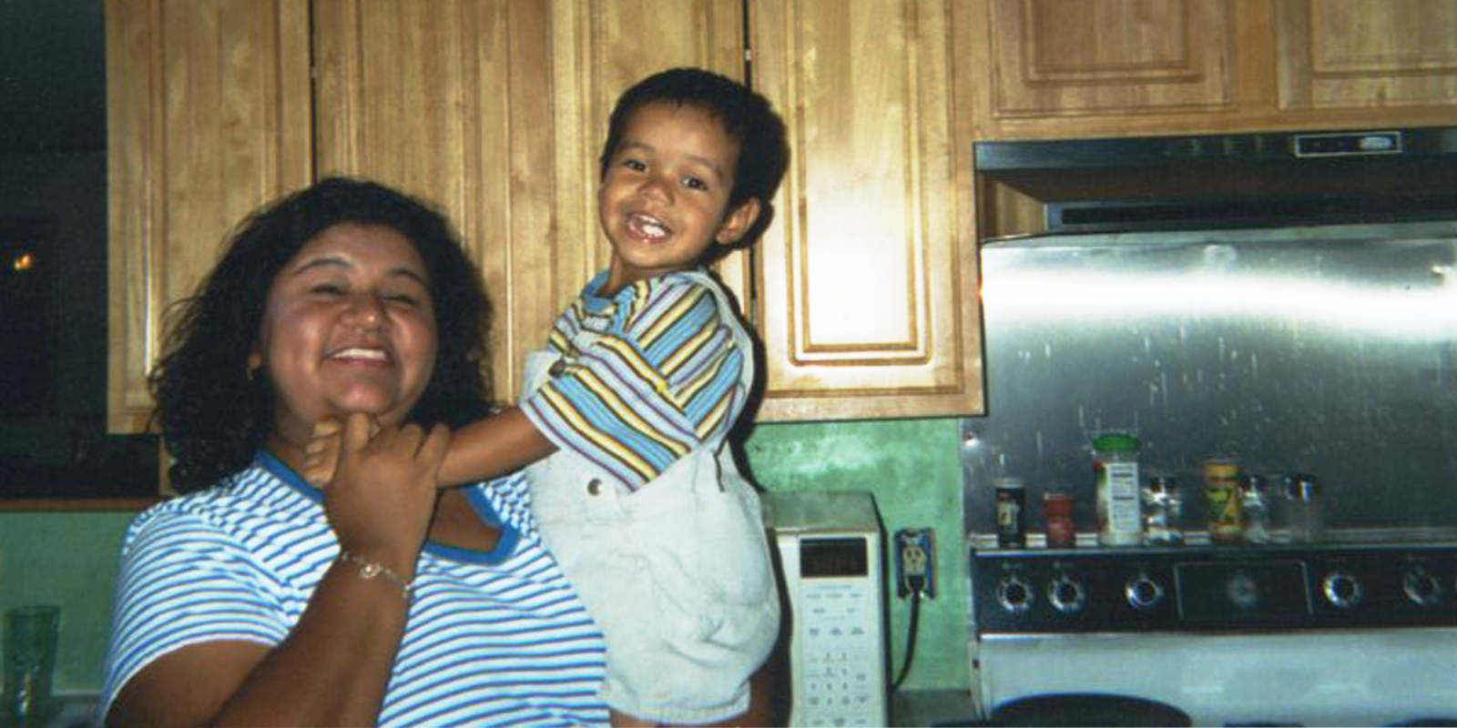 Melissa with Randy (approx 3 years old) in her kitchen